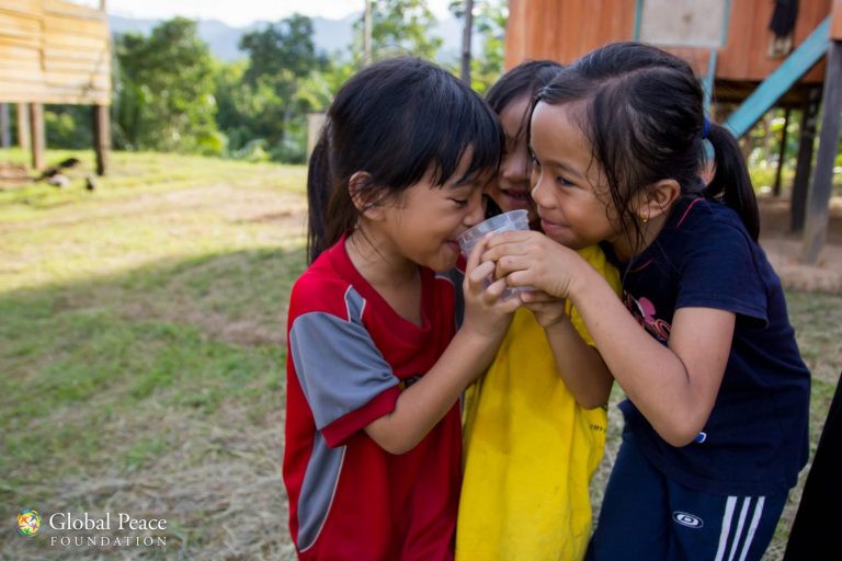 33824239404_cf045efb93_o Kids of the village were excited about the clean water that came out of what was described as a “robotic” looking thing!