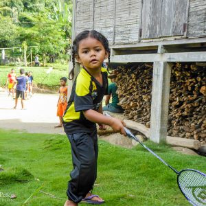 Orang asli child playing badminton in Ulu Geroh